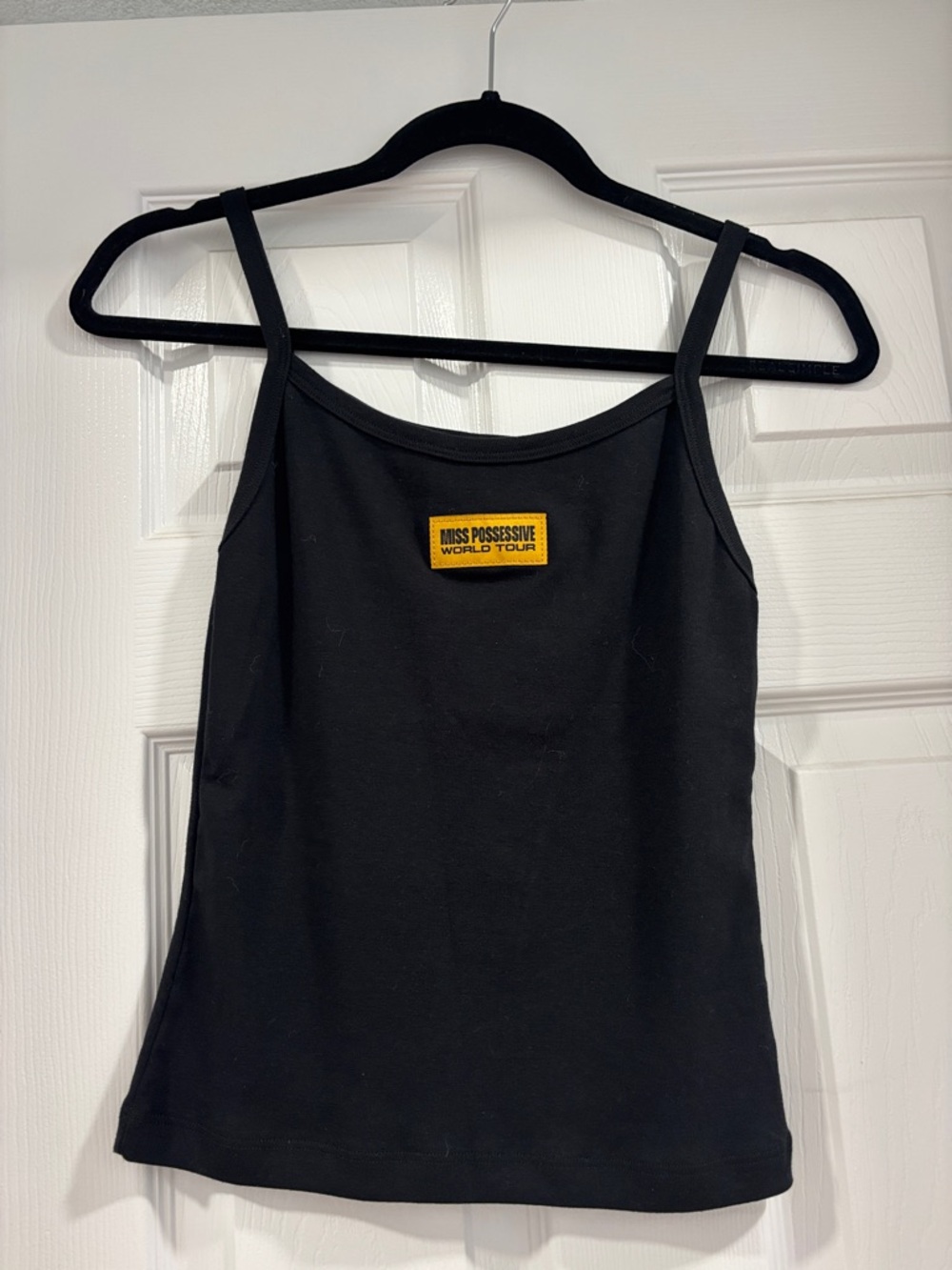 Official Tate McRae tour merch ! Black Spaghetti Strap Tank Top